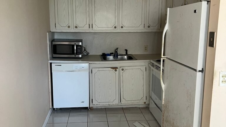 Old refrigerator and dishwasher ready for appliance removal