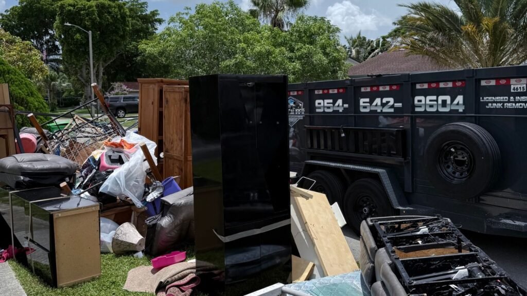 Property cleanout with furniture and junk removal trailer